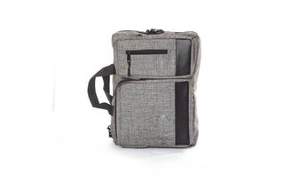 A grey multi-pocket laptop backpack open to show the padded laptop compartment